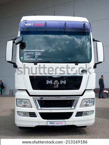 VILNIUS - MAY 9: MAN TGX 8.440 4x2 BLS truck on May 9, 2014 in Vilnius, Lithuania. MAN AG, is a German mechanical engineering company. MAN supplies trucks, buses, diesel engines and turbomachinery.
