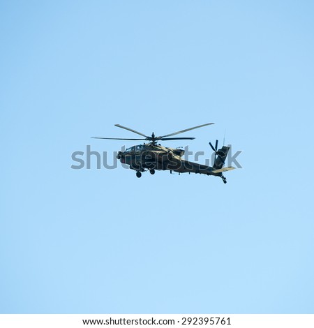 VILNIUS - MAR 22: US Army Apache AH-64 Helicopter during the Dragoon Ride Exercise on March 22, 2015 in Vilnius, Lithuania. The Boeing AH-64 Apache is a four-blade, twin-turboshaft attack helicopter.