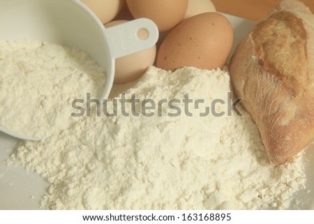 Baking Flour in Outdoor Setting with Egg