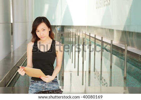 Asian Young Career Woman Outside an Office