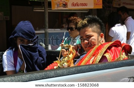 PHUKET, THAILAND - OCTOBER 13: A traditional Mah Song or warrior in the street procession of The Phuket Vegetarian Festival in Phuket Town, Phuket, Thailand on the 13th October, 2013.