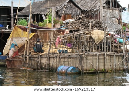 SIEM REAP, CAMBODIA - NOVEMBER 23: Traditional village life in Kampong Phluck on Tonle Sap Lake, Siem Reap, Cambodia on the 23rd November, 2013.