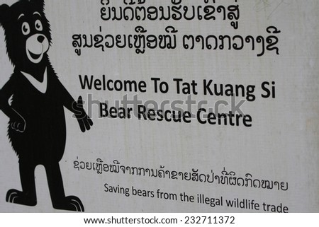 LUANG PRABANG, LAOS - AUGUST 16: A black and white sign erected by the Bear Rescue Center at the Tat Sae Waterfall near Luang Prabang in Laos taken on the 16th August, 2014.