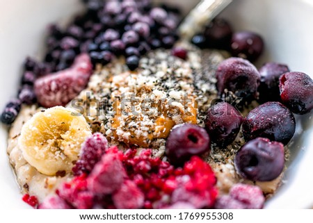 Similar – Image, Stock Photo Hot porridge with frozen blueberries