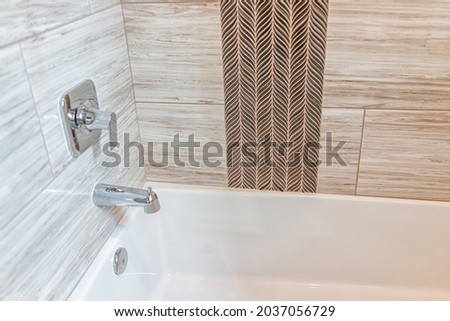 Similar – Foto Bild Wasserhahngriffe an der Wand im Badezimmer