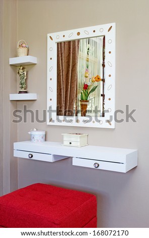 dressing table corner for small space in brown room interior closeup