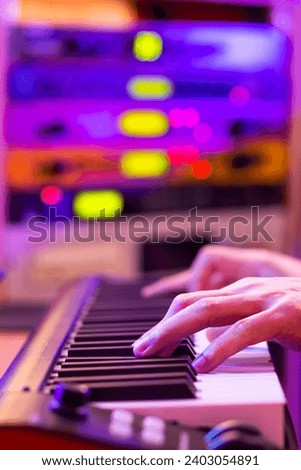 Similar – Image, Stock Photo Hands playing a midi keyboard in a music studio