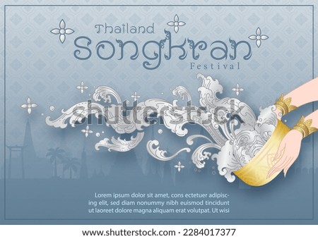 Closeup and crop woman hands holding a golden bowl splashing water in the traditional Thai pattern style with the name of event on gradient blue background. Poster of Thailand Songkran festival.