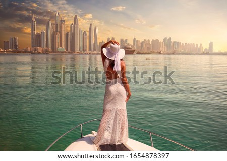 Image, Stock Photo Woman with boat standing in river