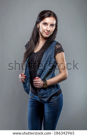 Beautiful girl in jeans clothes