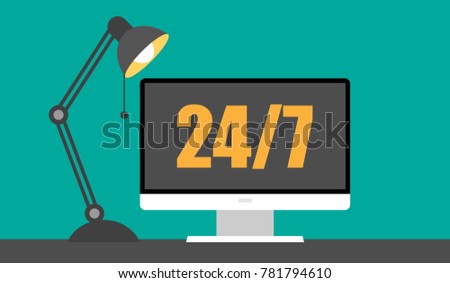 Computer with table lamp and 24/7 on the screen