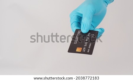 Similar – Image, Stock Photo hands wearing blue gloves holding culture dish
