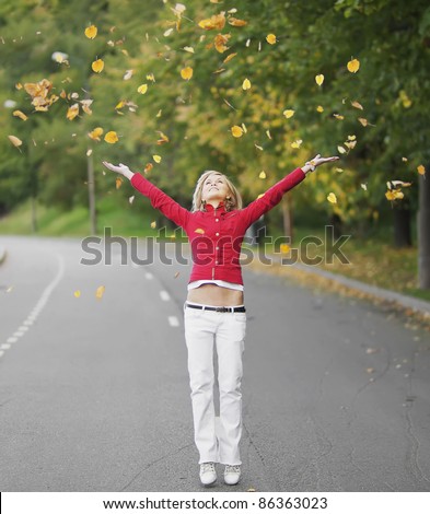 woman drop up leaves