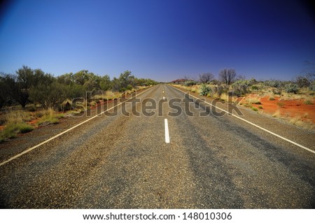 Highway running through the Australian Outback, near Alice Springs