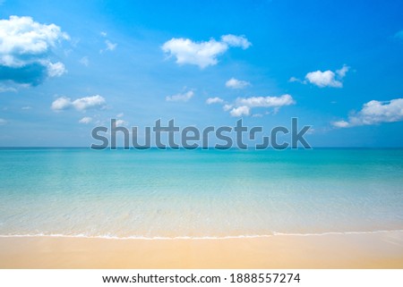 Summer day Phuket beach sea sand and sky. Landscape view of beach sea in summer day. Beach space area. At Karon Beach, Phuket, Thailand. On 15 December 2020