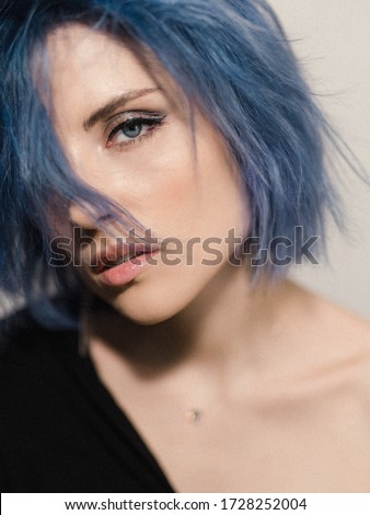 Similar – Image, Stock Photo Girl with blue hair and pink makeup with light dots on her face