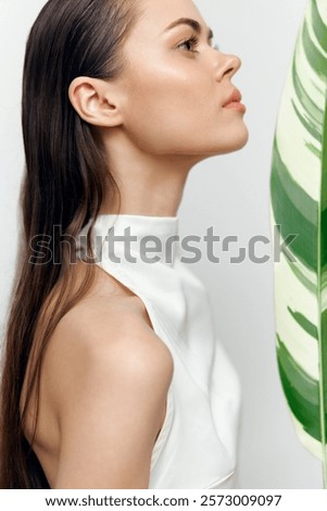 Similar – Image, Stock Photo Stylish tranquil woman against blue sky