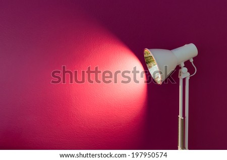 Modern lamp with empty purple wall to add some text, logo, image, etc.