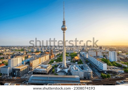 Similar – Image, Stock Photo The Berlin TV tower from above, behind a safety net in very bad weather. The horizon can only be seen as a small ray of hope.