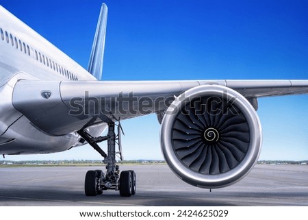 Similar – Image, Stock Photo An airplane takes off into the diffusely glowing sky