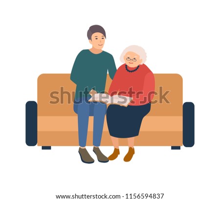 Young male volunteer sitting on sofa with happy elderly woman and looking photos in photographic album. Social volunteering, assistance and care for old people. Vector illustration in cartoon style.