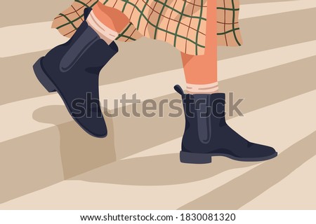 Woman in black trendy chelsea boots. Female legs in stylish comfortable leather demi-season footwear. Fall or spring shoes flat vector illustration