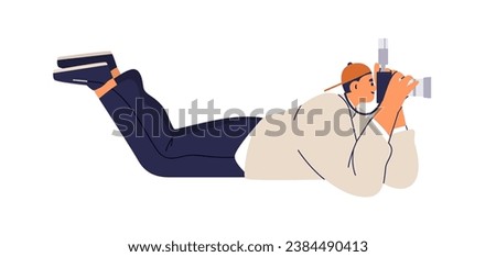 Photographer lying with camera, taking photo. Creative man holding professional lens equipment, photographing, shooting, making pictures, shots. Flat vector illustration isolated on white background