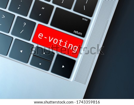 Electronic or internet voting concept (e-voting or online voting). Keyboard with red button with e-voting written on. Safe way to vote to maintain social physical distancing during covid pandemic