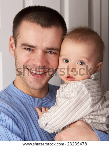 Happy daddy with the little son