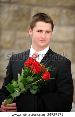 The young man with a bouquet