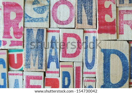 Wooden printed letters texture background