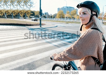 Similar – Image, Stock Photo Woman with bicycle walking in park