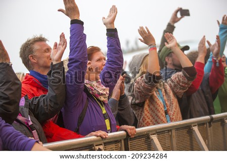 Traena, Norway - July 10 2014: during the concert of the Norwegian folk rock band  Hekla Stalstrenga at the Traenafestival, music festival taking place on the small island of Traena.