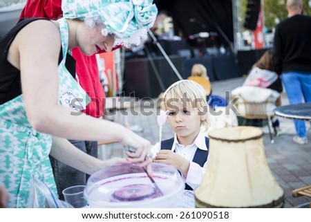 Amsterdam, The Netherlands, 12-14 September 2014, at West\'ival, a free open air Cinema and culture festival on Mercatorplein. getting candy floss before the screening