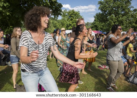 Amsterdam, The Netherlands - July, 5 2015: African dance workshop during Amsterdam Roots Open Air, a cultural festival held in Park Frankendael on 05/07/2015