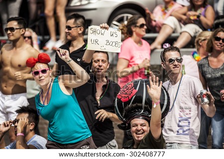 Amsterdam, Netherlands - August 1, 2015: participants in the annual event for the protection of human rights and civil equality - Gay Pride Parade on the Prinsengracht, Amsterdam