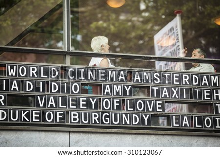 Amsterdam, The Netherlands - August 22 2015: sign announcing movies at the front of Rialto Cinema during World Cinema Amsterdam festival, a world film festival held from 14 to 23/08/2015