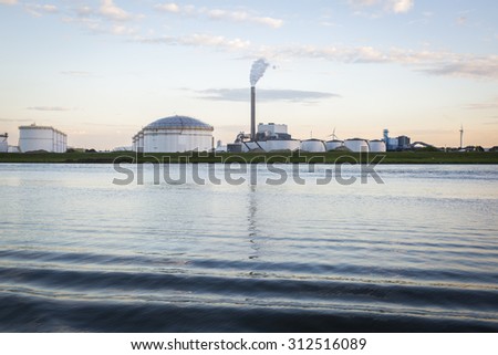 Amsterdam, the Netherlands, August 29, 2015: view of the port of Amsterdam, the biggest cocoa harbour in Europe, with its industrial installation and tanks