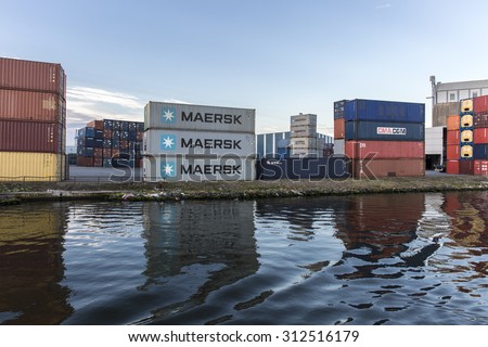 Amsterdam, the Netherlands, August 29, 2015: view of the port of Amsterdam, the biggest cocoa harbour in Europe, with its industrial installation and containers