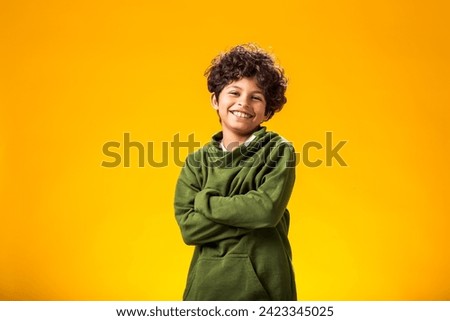 Similar – Image, Stock Photo Portrait of adorable boy in Santa Claus hat on blue studio background. Christmas