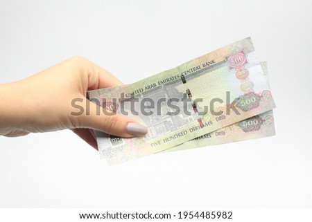 Similar – Image, Stock Photo hand holding 500 coins indonesian rupiah