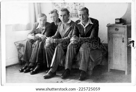KRAKOW,POLAND - CIRCA 1934: vintage photo of five young men