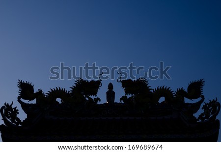 silhouette chinese dragon in evening
