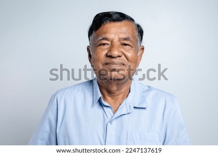 Similar – Image, Stock Photo Old man in good shape running on road along plant fence