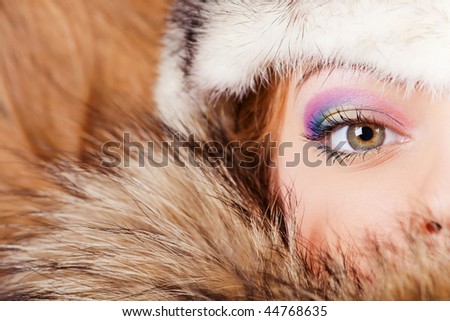Woman in fur hat face closeup