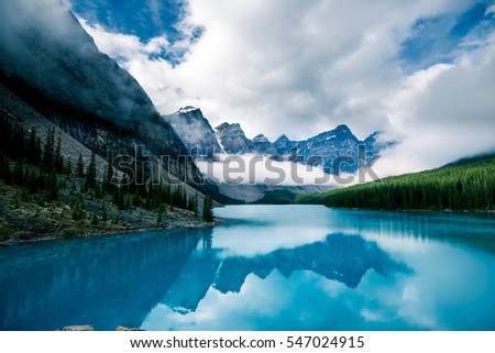 Similar – Foto Bild Ruhiger See und Berge bei Sonnenuntergang