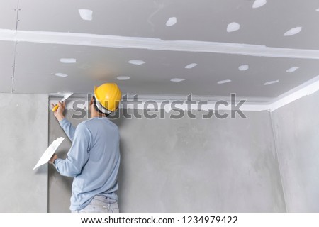 Similar – Image, Stock Photo Craftsman working with plaster in art studio