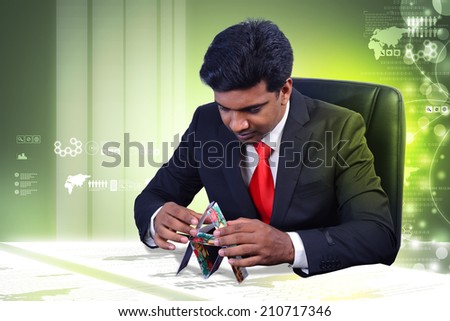 Business man creating model with cards