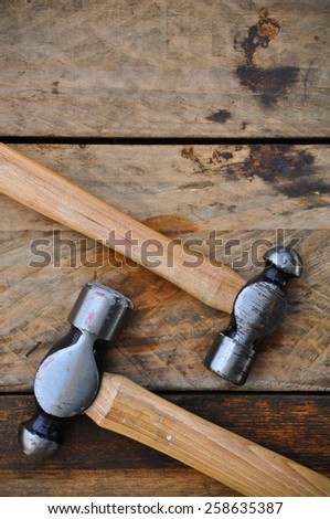 Hammer set of hand tools or basic tools on wooden background.