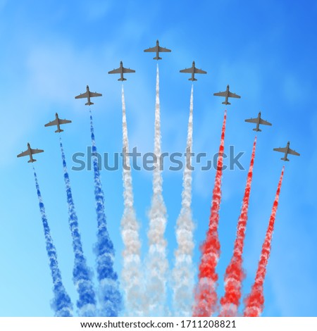 Vector illustration with nine planes and trails in blue white and red colors of the flag of France or USA isolated on sky background. USA Independence Day or France Bastille Day greeting card.